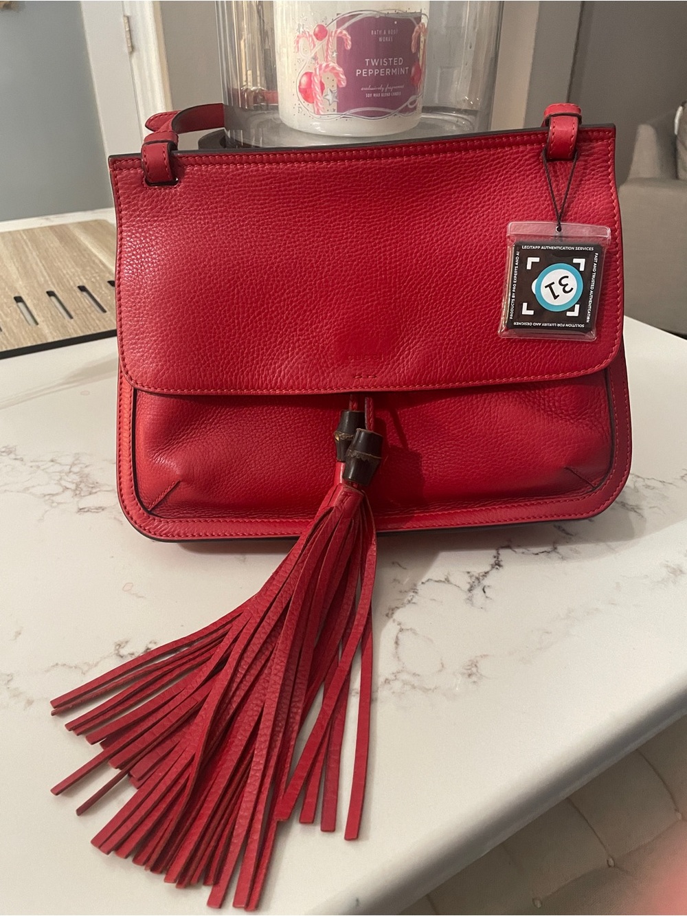Gucci Bamboo Tassel Crossbody/Shoulder Bag in red pebbled leather.